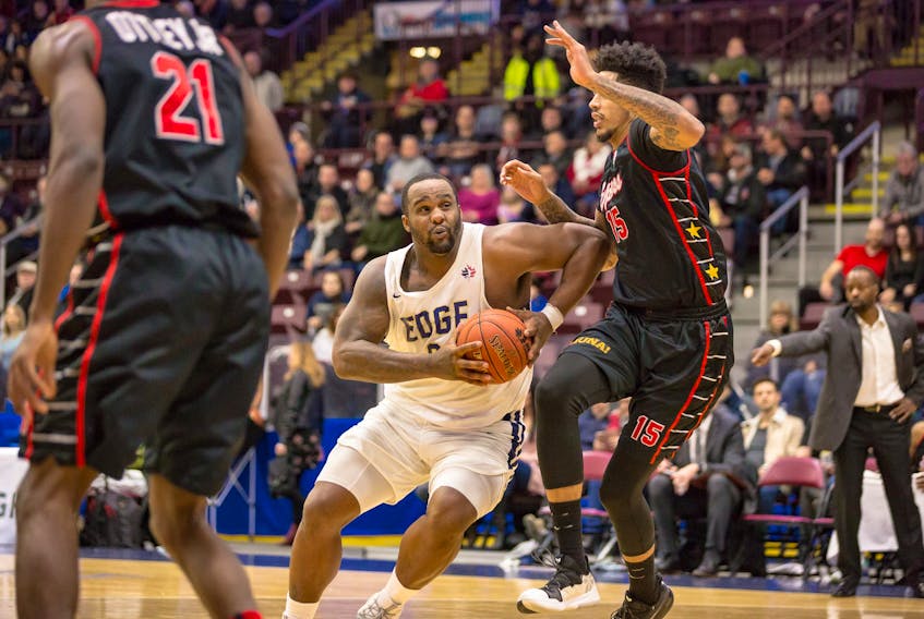 Glen Davis (centre) returned to action to score 17 points and add nine rebounds in the St. John's Edge's 97-90 win over the Windsor Express Friday night at Mile One Centre. — St. John's Edge photo/Jeff Parsons