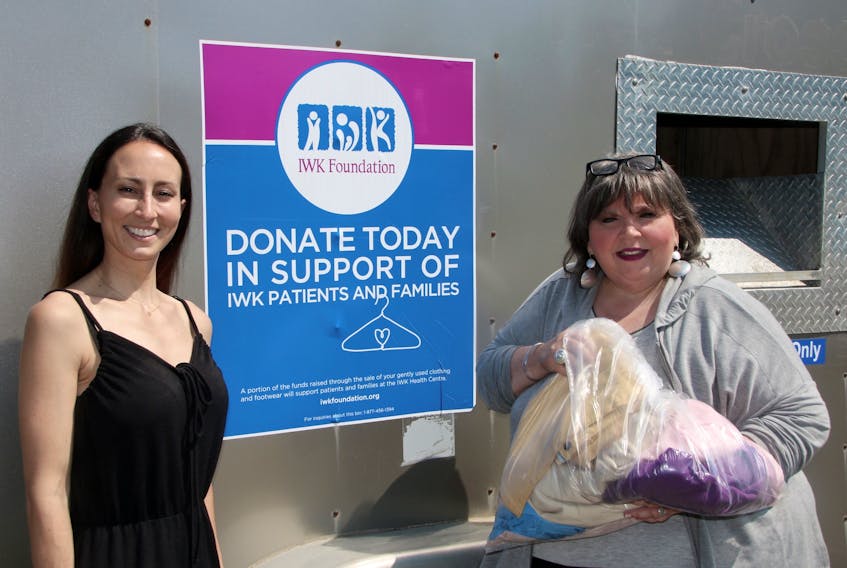 Leanne LeBlanc, of LML Trading, right, had the IWK clothing trailer in Truro recently. Town councillor Cathy Hinton stopped by and dropped off a few items during the day. The trailer will be making regular visits during the summer.