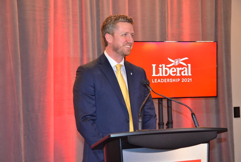 Iain Rankin speaks with media after being named the new leader of the Liberal party of Nova Scotia at the Halifax Convention Centre on Saturday, Feb. 6.