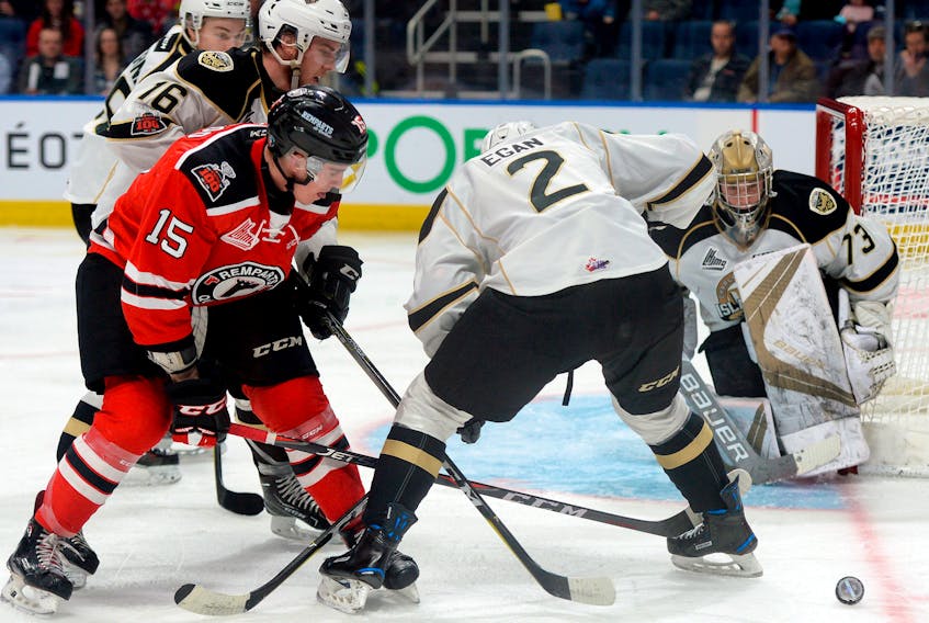 Charlottetown Islanders goaltender Matthew Welsh keeps his eyes focused on the puck as it squirts lose during a scramble in front of the net during Game 2 of the Quebec Major Junior Hockey League playoffs series with the Quebec Remparts. - Photo by Erick Labbe/Le Soleil
