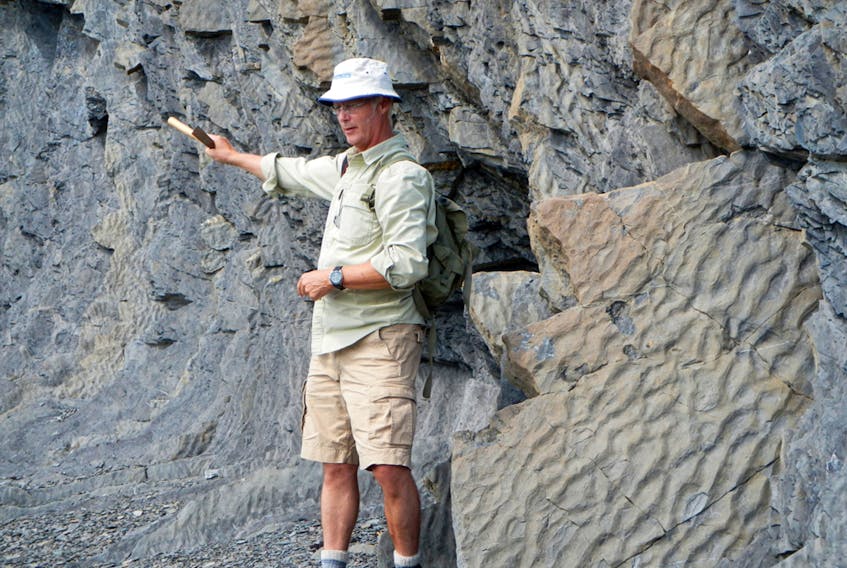 Retired Nova Scotia geologist John Calder during one of his many exploratory expeditions along the Cliffs of Fundy.