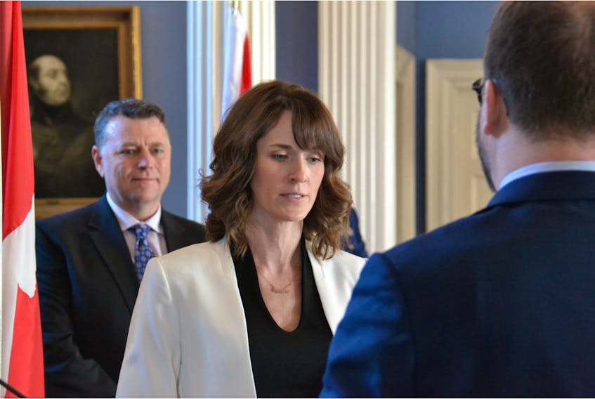 Charlottetown-Hillsborough Park MLA Natalie Jameson was appointed as minister of environment, water and climate change during a ceremony at Government House on Feb. 21. Looking on is Premier Dennis King.