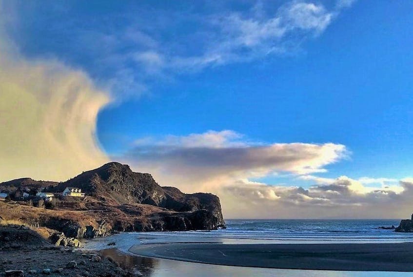 Imagine … waiting for that wild wave to climb the rocks and just before it crashes, snapping the perfect photo.  Well, that's not what took place here. Jerome Canning has a great eye and noticed this intriguing cloud that looked like a wave coming over the rocks.  This stunning photo was taken last week, at Salmon Cove in Newfoundland. Salmon Cove is a small town on the northern tip of the Avalon.