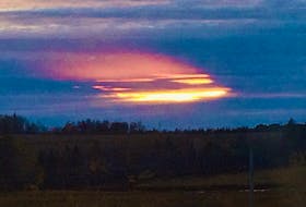 Jack Sorensen snapped this unusual photo of the setting sun over Tryon, P.E.I. He knew there had to be an explanation.