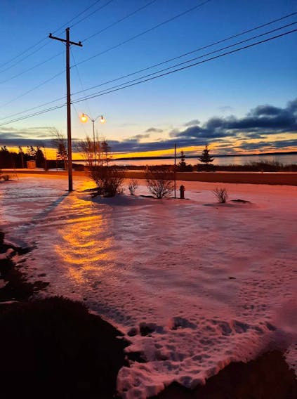 Chris Pharo was so impressed by the photo his wife, Cathy, took last week that he wanted to share it with everyone.  The Pharo's have a great view of the Summerside Harbour from their front porch. The colours that morning were staggering. Where did the foam come from? It's just snow with some magic from the early morning light.