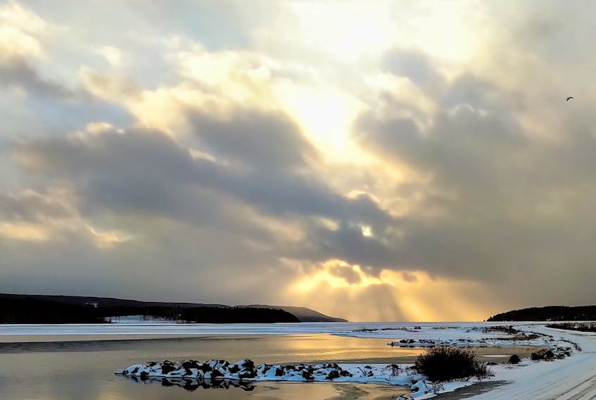 The Bras d'Or Lakes don't ever disappoint when it comes to stunning scenery. George Karaphillis was going over the East Bay Sandbar Rd in Cape Breton, N.S. when he noticed the sun's rays beaming down from a cloud while fresh flurries flew through the air.