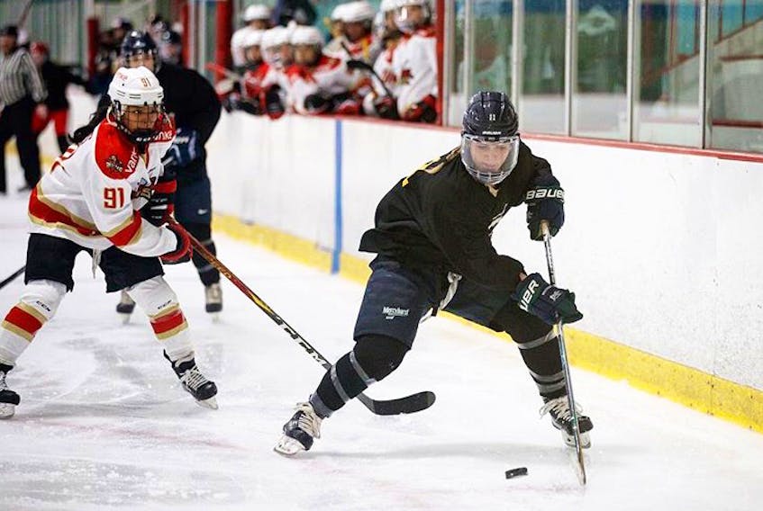 Jennifer MacAskill in recent exhibition action with the Worcester Blades of the Canadian Women's Hockey League, versus a team from China, which also competes in the league. Contributed