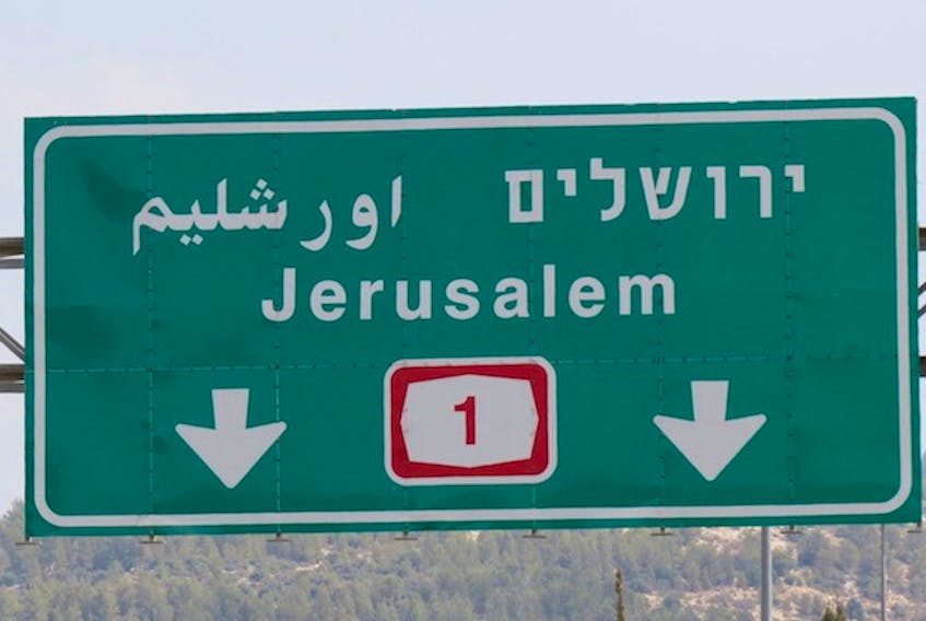 An Israeli road sign that omits Jerusalem’s Arabic name (‘Al-Quds’), instead using the Hebracized Urshalim.

(Haokets Photo)