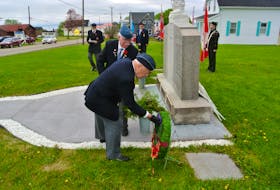 Second World War veteran David Coleman lays a wreath next to the cenotaph in Joggins in recognition of the 75th anniversary of D-Day on June 6. The community’s cenotaph was also rededicated with the addition of 10 names of veterans from the area who died during the First World War.