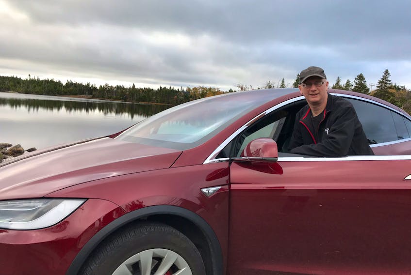 Jon Seary from Portugal Cove-St. Philip's, N.L., has been driving the Tesla Model X SUV for four years and says the performance and cost savings have surpassed his expectations. Although he purchased the vehicle without any subsidies, he argues in favour of rebates for electric vehicle purchases.