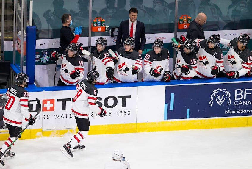 Cornwall's Jordan Spence celebrates his goal Sunday against Slovakia with teammates during Canada's second game at the world junior hockey championship in Edmonton.