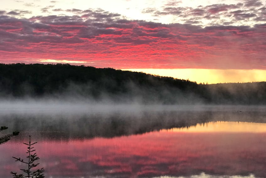 A glorious sunrise over River Lake, Mooseland, N.S., captured by Ward Clattenburg.