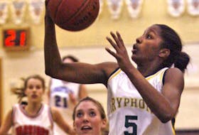 Halifax Grammar School’s Justine Colley drives to the basket during a game against Charles P. Allen in 2007.