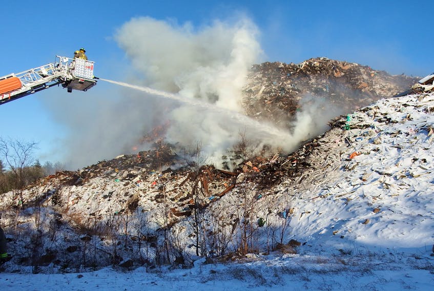 Firefighters fought the fire that broke out March 22, 2016 at the disposal and transfer site owned by Derrick Shaffer until they declared it extinguished March 27. -Art Hamilton