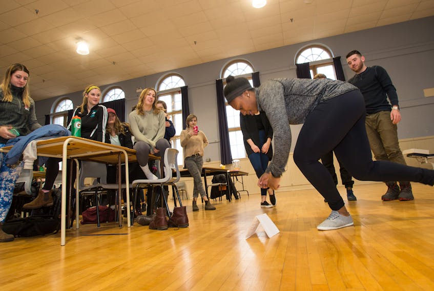 Senior Kinesiology student Joy Cheikwe takes part in a fun mobility experiment during the senior class’ last get-together to celebrate their community involvement efforts over four years of studies at Acadia.