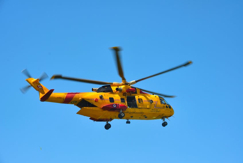 A search and rescue Cormorant helicopter and crew from 14 Wing Greenwood’s 413 Transport and Rescue Squadron prepares to touch down on the soccer field at KCA in Kentville. - Kirk Starratt