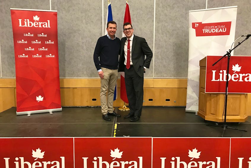Kody Blois, right, the recently nominated Liberal candidate for Kings-Hants, poses for a photo with former Kings-Hants MP Scott Brison following his nomination on May 11 at Avon View High School.
