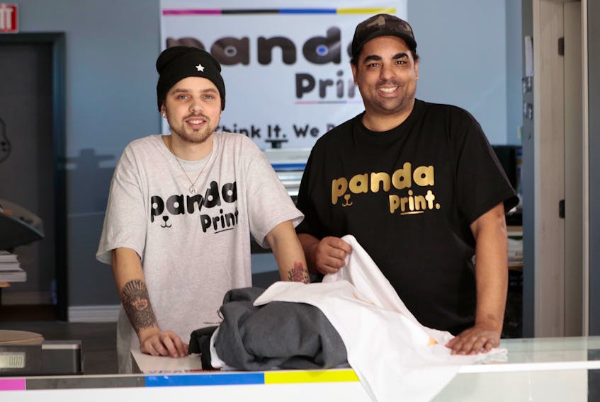 NOW participants Jacob Neary and Chuck Seale, owner of Panda Print in New Minas.
