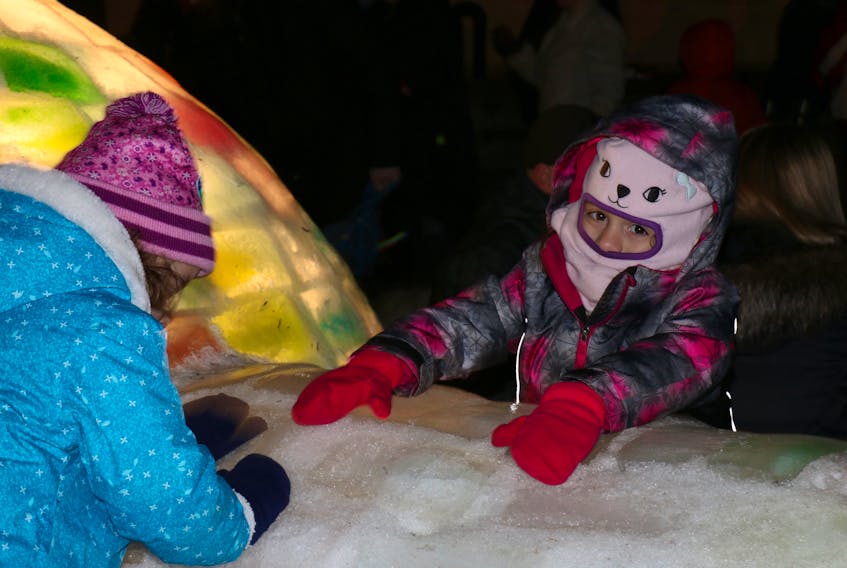 Five-year-old Josie Griffin, from Windsor, was one of many youngsters fascinated by the colourful igloo at the 2019 Hantsport Winter Carnival.