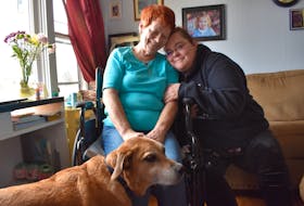 Wanda Redden, pictured with her daughter Tammie Smith and beloved canine companion Buddy, is facing ALS head on and looking to reach out to others battling the incurable motor neuron disease.