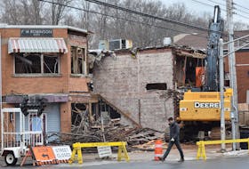 A demolition crew from Mid Valley Construction could be seen deconstructing the vacant F.W Robinson building in downtown Kentville Feb. 8.