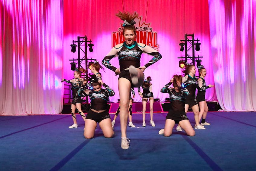 Emma Taylor leads with a stunt with her Valley Cheer Athletics squad that placed first at the Canadian Cheer Evolution national championships March 6. - photo by Captured Moments, Canadian Cheer Evolution
