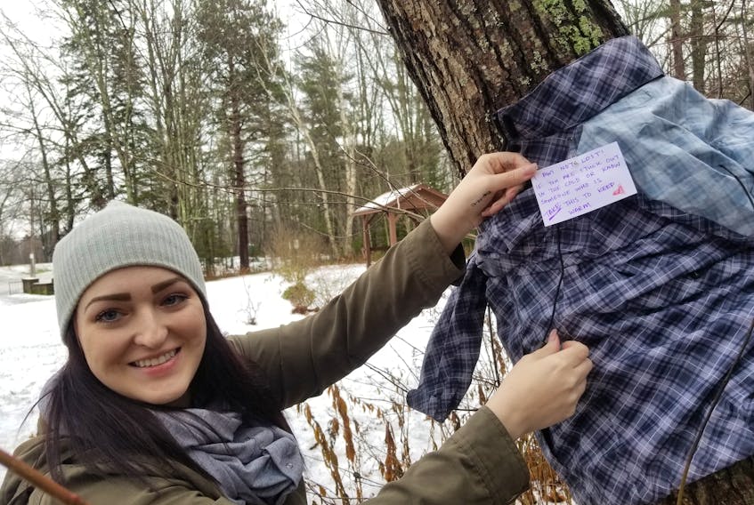 Jessica Garnett-Saunders has placed scarves, jackets, hats and mittens to trees and other public fixtures in Kingston for anyone in need to take, and use to fight off the cold.