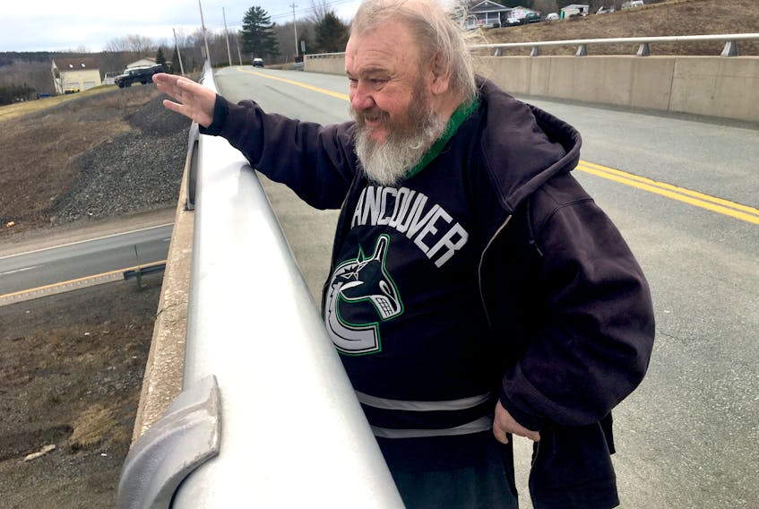 Freddie Wilson has been waving from the Hantsport-area Highway 101 overpass that now bears his name since he was about 18. At 65, he says he intends to keep it up for those driving down below.