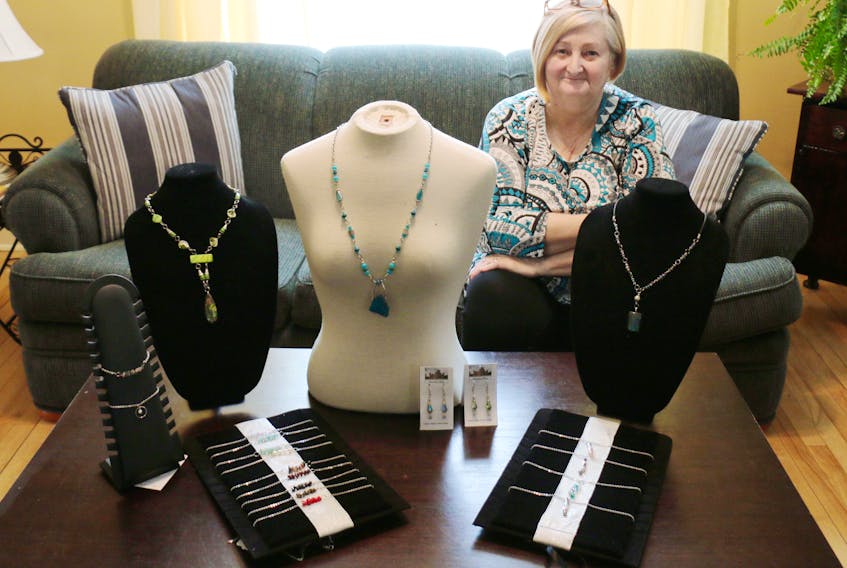 Windsor resident Mary Lou Bennett shows off a selection of her hand-crafted jewellery. She’s been making custom jewelery for several years.