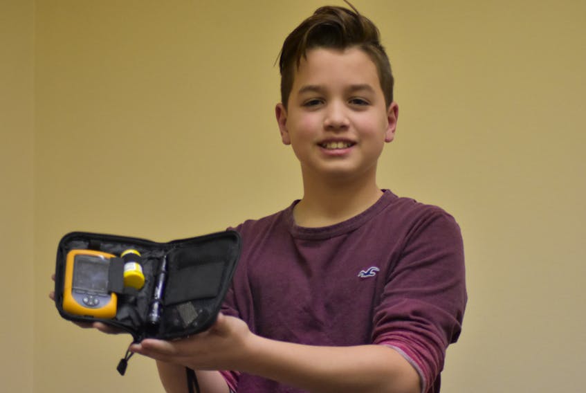 Hayden Whynot, 10, lives life with type 1 diabetes on his own terms with some help from treatment and testing tools - and his dedicated support network.