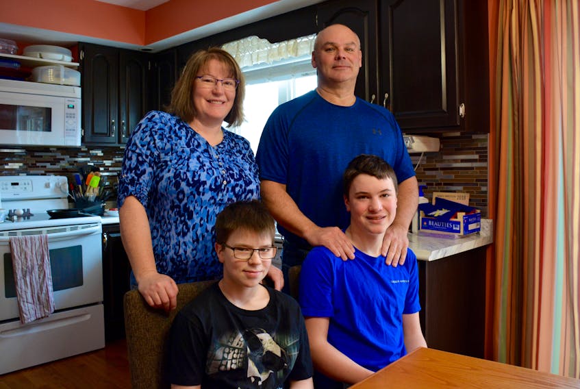 Sherri and Larry Miles with two of their four children, Dylan, 13 and Logan, 15. The family is part of a growing trend in East Hants — it’s the only municipality in the province with more young people than seniors.