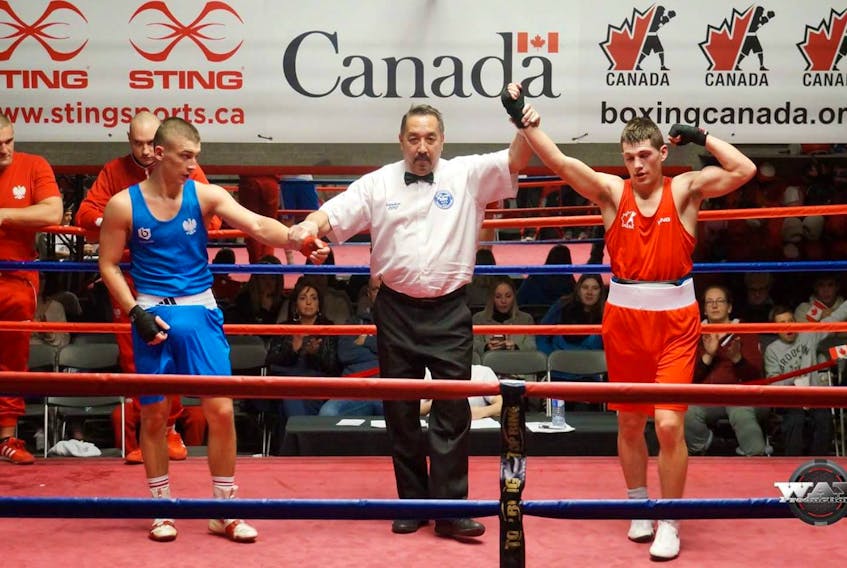 Wyatt Sanford (right) on the Canadian National Boxing Team, is victorious again Poland's Karol Kowal. Team Canada won 10 of 14 bouts during the dual match tournament. - Pierre Lavoie/Way Productions