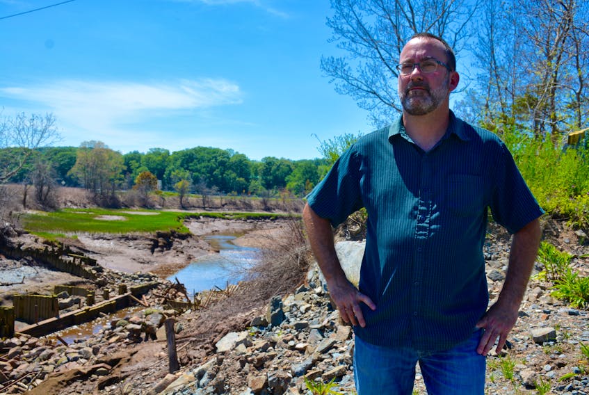 West Hants councillor for Hantsport, Robbie Zwicker, standing near the edge of the Halfway River, said he’s concerned about what increased tide waters could do to the surrounding lands.