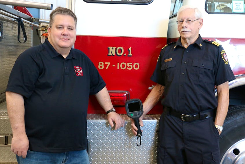 Firefighter Dan Boyd and Deputy Fire Chief Wayne Swinimer are hoping the community will help to raise the $11,000 needed to purchase a second thermal imaging camera for the Brooklyn Fire Department's Station 2 in Three Mile Plains.