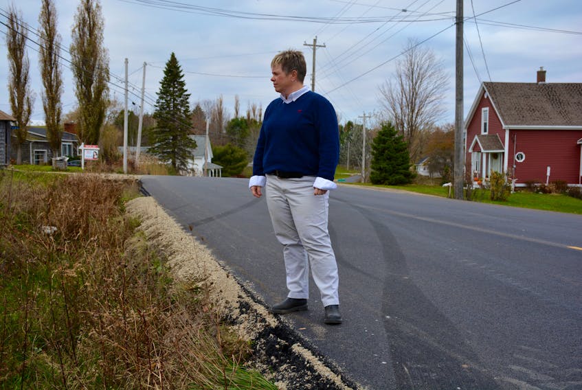 Christina Weagle, at the site of where her father’s truck crashed on Highway 1, where skid marks can still be seen. Her father wasn’t badly injured, but Weagle says she’s concerned that it took so long to install reflective markers.