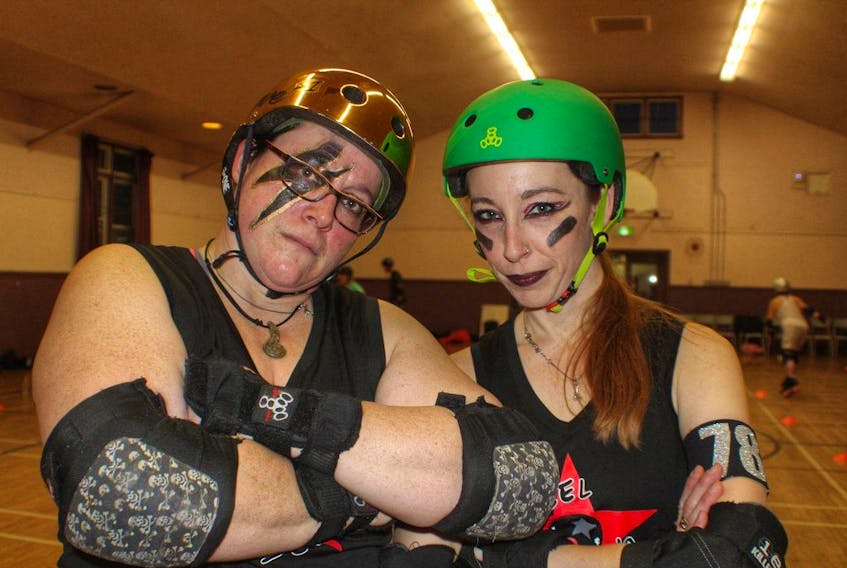 Tainted Shove (Marjie Lynn), left, and StrawBury Jam (Angela Jennex) are ready to take on the Kickin' Vixens, hailing from Pictou County, later this month with their derby team the Rebel Belles.