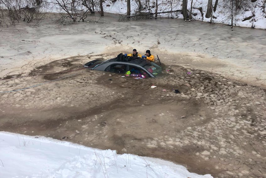 Volunteer firefighters stumbled upon a submerged vehicle off the connector highway near Hantsport while responding to a chimney fire in Mount Denson. Luckily both passengers got out safely.