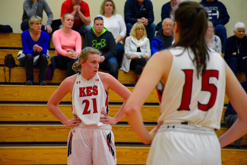Mackenzie Smith watches as an opponent takes a foul shot. - Colin Chisholm