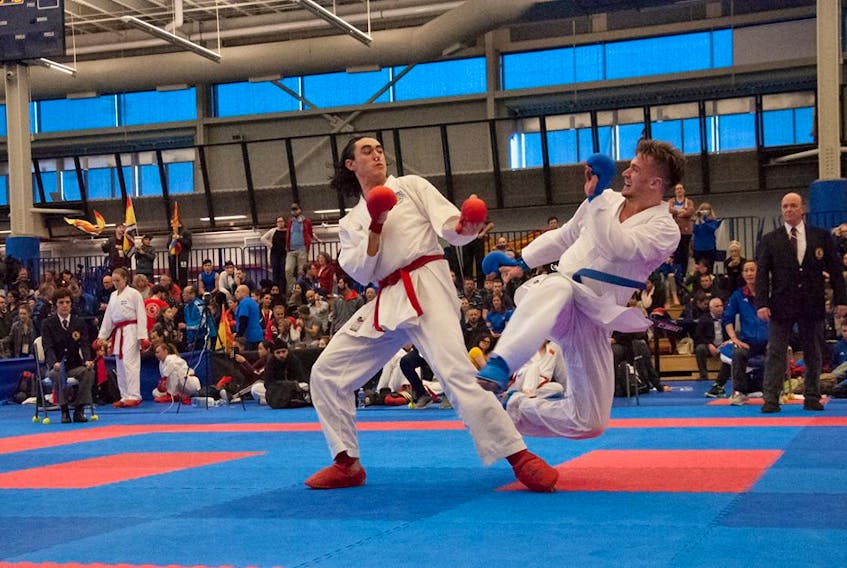 Roland Smith, left, participates in the National Karate Championships in Halifax.