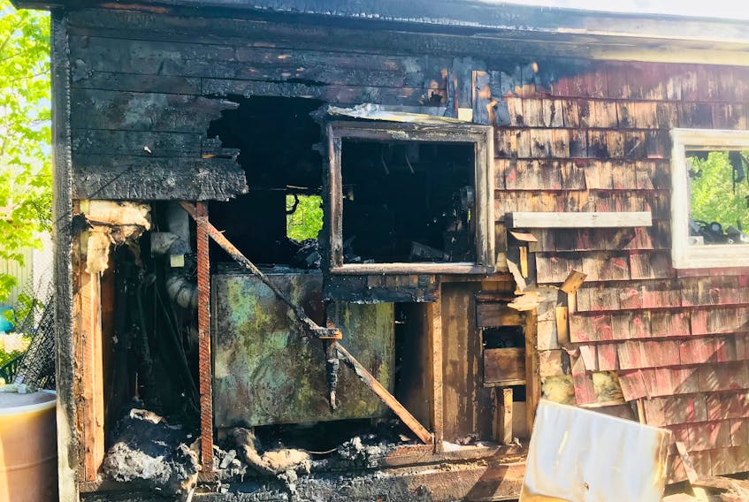 A garage structure was heavily damaged by fire the morning of May 24, 2018 in Mount Denson. Nobody was injured and the building is insured.