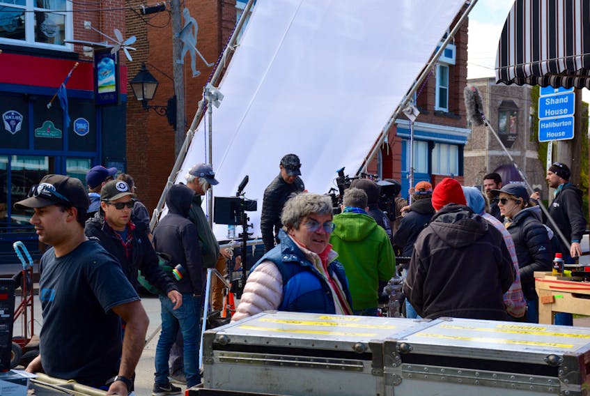 Dozens of crew, creatives and actors line Water Street in downtown Windsor as filming on PURE’s second season begins.