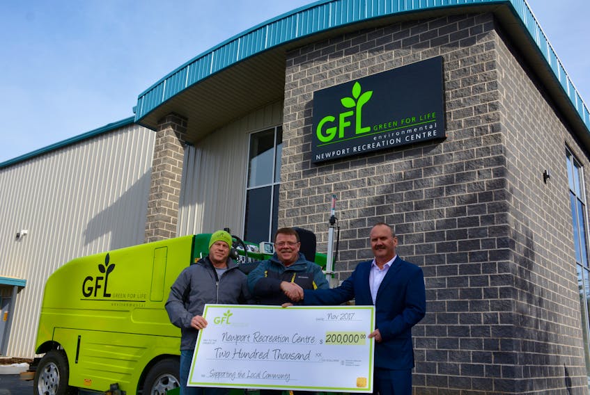 Shane Rogers (left), manager of the GFL Recreation Centre, Darryl Landry, president of the Newport and District Rink Society, and Joey Warwick, director of business development in Atlantic Canada for GFL.