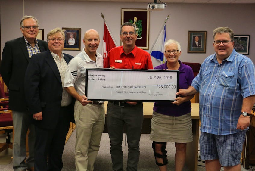 The fundraising committee for the proposed Long Pond arena in Windsor received a cheque July 26 for $25,000 from the Windsor Hockey Heritage Society. The committee includes, from left, Jim White, Greg Kelley, Joe Seagram, Jeff Redden, plus WHHS members Trina Norman (president) and Dan Boyd. Missing from the photo are Krista Lloy and Kevin Walsh.