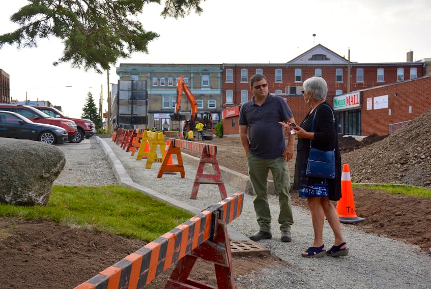 Windsor Mayor Anna Allen and Troy Burgess, the town’s superintendent of operations and Traffic Authority, discuss the waterfront connector prior to a funding announcement from Hants West MLA Chuck Porter.