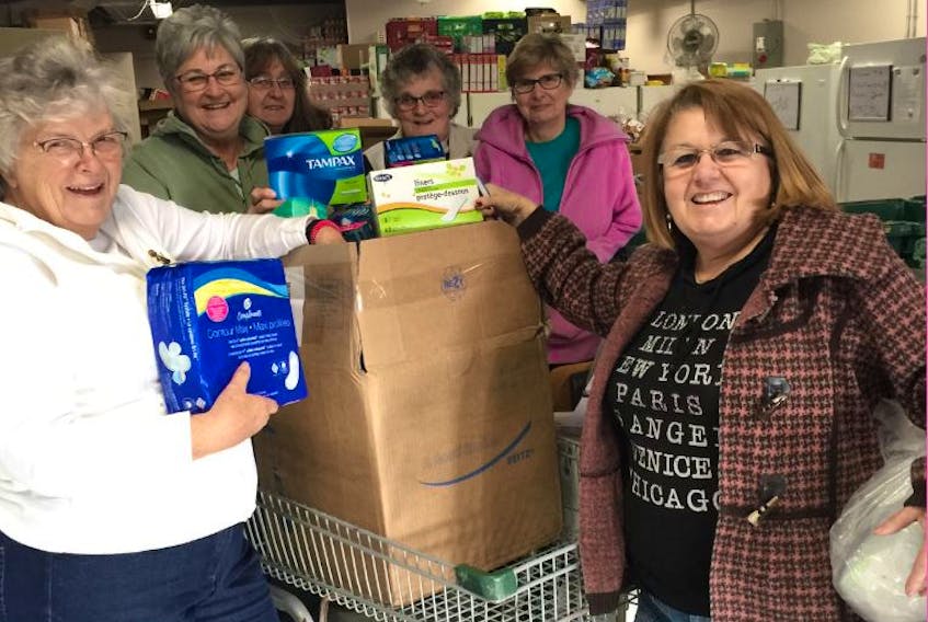 Volunteers with Matthew 25 Windsor and District Food Bank accepted a sizable donation of menstruation products from Meander River Farm & Brewery.
