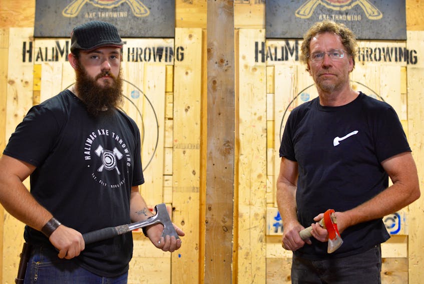 Steve Rex, left, of Kentville, and Fred Ansems, from Steam Mill Village, are heading to Chicago on Dec. 15 to participate in the World Axe Throwing Championship, which will be broadcasted on ESPN.