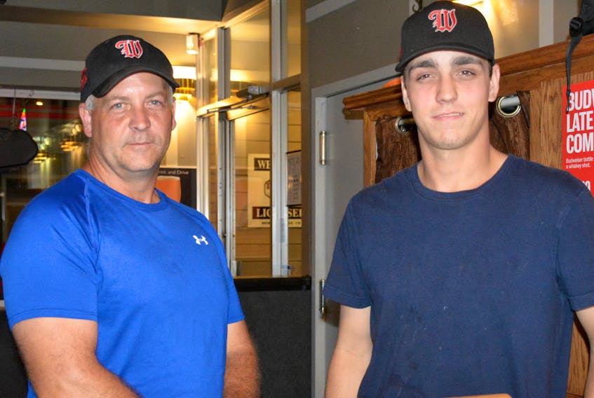 Alex and Austin Sabean, father and son, are also teammates on the Windsor Knights intermediate baseball team.