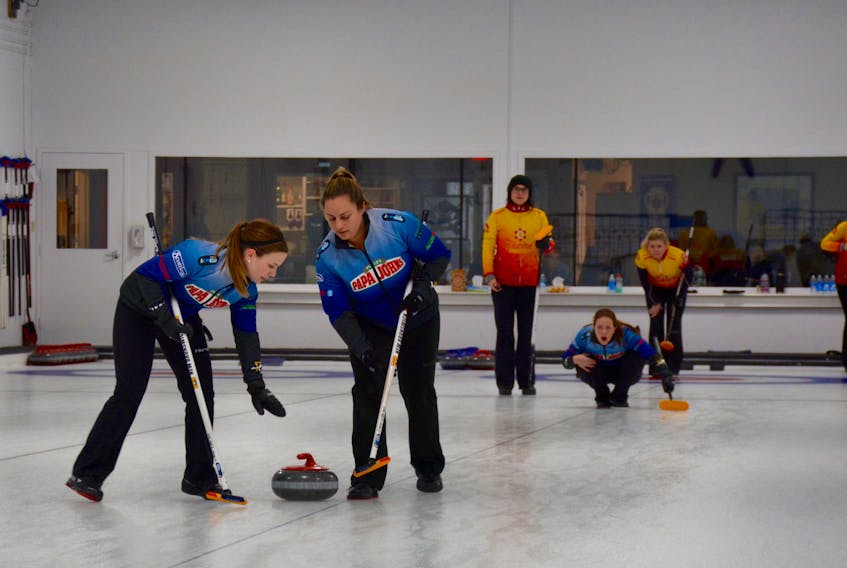 The team from PEI (yellow/orange) took on a team from New Brunswick (blue) in the final game of the Time Hortons-Spitfire Arms Cashspiel.