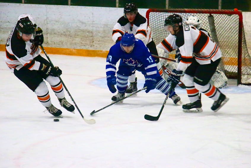 The Valley Maple Leafs took on the Sackville Blazers Feb. 8 in Windsor. Pictured keeping the pressure on the Blazers is Kyle Keddy (No. 19).