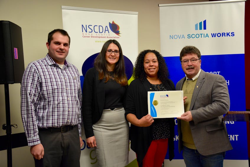 From left Burrell Lyons, the service centre manager with Glooscap First Nation, Catalina Hoffman, a Nova Scotia Works client, Rebekah Skeete, NSCDA certificate recipient, and Hants West MLA Chuck Porter were among those who attended a press conference recognizing the milestones of the Nova Scotia Works program in Windsor.